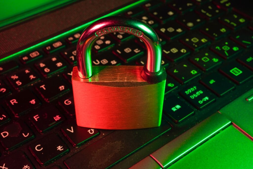 Cybersecurity concept with padlock on laptop keyboard representing encryption and security considerations for cloud softphones