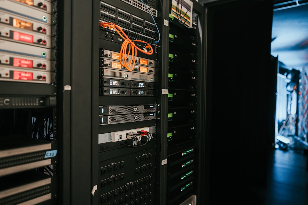 Get Free Demo Server rack infrastructure in data center representing cloud telephony and Class 5 softswitch deployment environment. Photo by Taylor Vick on Unsplash